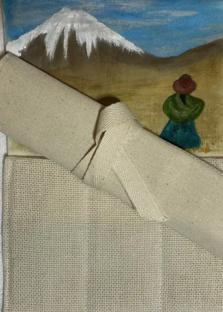 Hand-painted linen pouch with a mountain landscape and a small green figure